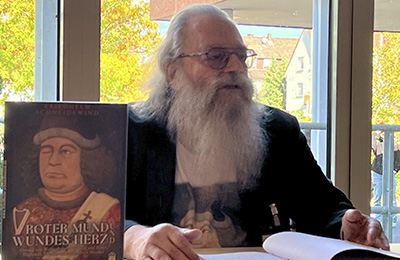 10.10.26: BuCon &ndash; BuchmesseCon &ndash; das phantastische Treffen:
Lesung mit Musik aus dem Roman &raquo;Roter Mund und wundes Herz&laquo;