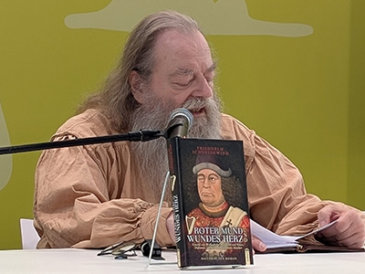 Lesung mit Live-Musik aus meinem Roman &raquo;Roter Mund und wundes Herz&laquo; (21.3.2026)