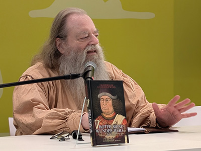 Lesung mit Live-Musik aus meinem Roman &raquo;Roter Mund und wundes Herz&laquo; (21.3.2026)
